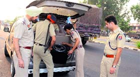 A file photo of policemen checking a vehicle during the special drive in Ludhiana.