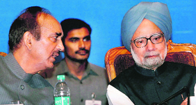 Prime Minister Manmohan Singh with Union Minister for Health and Family Welfare Ghulam Nabi Azad in New Delhi on Saturday.