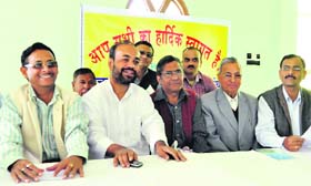 Members of the Rajya Andolankari Manch during a press conference in Dehradun on Sunday
