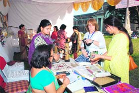 Delegates at the International Poplar Conference at the stall of the Prerna souvenir shop in Dehradun