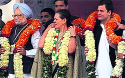 Prime Minister Manmohan Singh, AICC chief Sonia Gandhi and Congress general secretary Rahul Gandhi at a party rally in New Delhi on Sunday