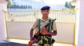 A security guard outside the civil secretariat in Jammu on Sunday.