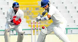 Debutant Jiwanjot Singh, who scored a double century, square-cuts on Sunday.