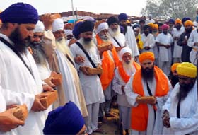 Members of various Sikh organisations take part in foundation-laying ceremony of a gurdwara at Fatehgarh Gehri village in Ferozepur district on Monday.