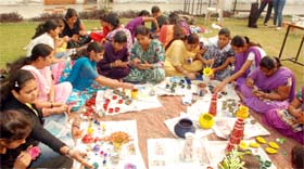 Students of the fashion technology department of Swami Vivekanand Girls College atend a workshop to prepare for the Diwali Mela that begins on November 9.