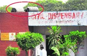 Empty water tanks lying on the roof of the civil dispensary at Sector 40