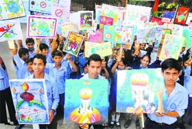Students of Government Model School, Sector 46, hold placards during an anti-crackers rally in Chandigarh on Monday