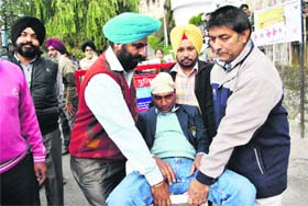 A mock drill exercise on first aid being carried out by the Red Cross Society, Punjab branch (Chandigarh), in Mussoorie on Sunday