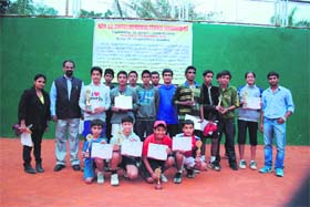 The winners of the Second Brother SE Coffey Memorial Tennis Tournament with Brother AJ George, Principal, St Josephs Academy, in Dehradun on Monday