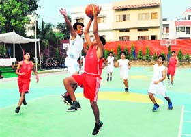 A match in progress in the 1st All-India Asian Challenge Basketball Tournament 2012 in Dehradun on Monday