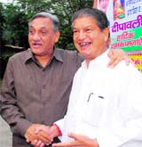 Chief Minister Vijay Bahuguna meets Union Water Resources Minister Harish Rawat at his residence in New Delhi on Monday.