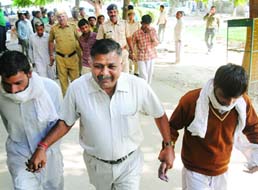 Gang rape accused of a teenaged girl being produced in a local court in Karnal on Monday.