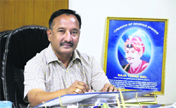 SDM-I Iqbal Singh Sandhu has a portrait of Raja Todar Mal at his office in Jalandhar. 