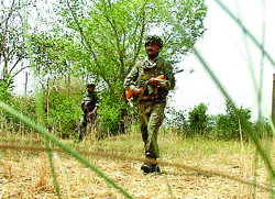 Soldiers keeping vigil in a remote area in Poonch district. A Tribune photograph 