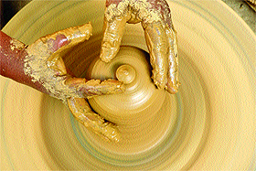 As Divali approaches, a potter gives shape to earthenware in Jammu on Monday.