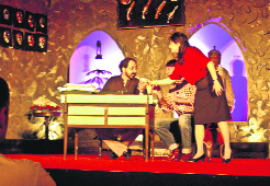 Artistes enact a scene from play Murder in Srinagar on Sunday. 