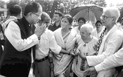 Assam Chief Minister Tarun Gogoi greets Priyambada Patel Hazarika, widow of late Bhupen Hazarika, in Guwahati on Monday.  PTI