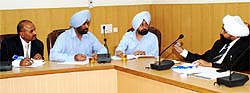 District and sessions judge, Bathinda, Jaspal Singh (right) presides over a meeting convened to discuss arrangements for the zonal level legal literacy fest to be held in Bathinda on November 17