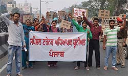 Special trainer teachers take out a protest march in the city on Tuesday