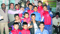 The winners of the 12th State College Boxing Competition in Kotdawar on Tuesday. A Tribune photograph 