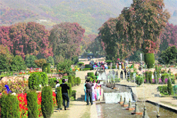 Tourists at the Nishat Garden in Srinagar on Tuesday.