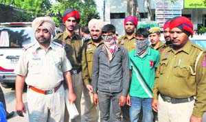 The accused in police custody in Ludhiana on Tuesday.