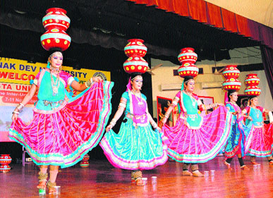 Students of Guru Nanak Dev University perform a dance during the 28th North Zone Inter-University Youth Festival Guldasta at the university in Amritsar on Wednesday.