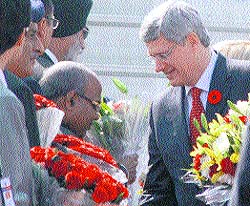 Canadian PM Stephen Harper being received by Adviser to the UT Administration Satya Gopal on Wednesday