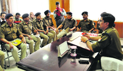 New Dehradun SSP Kewal Khurana chairs a meeting in Dehradun on Wednesday. Tribune photo: Vinod Pundir 
