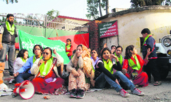 Activists of the Citizens for Green Doon stage a protest at Dehradun DFOs office on Wednesday. A Tribune photograph 