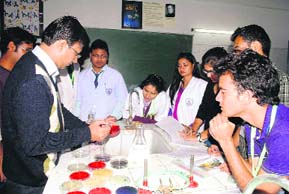 Students at participate in a workshop on microbiological technique used in the pharma industry
