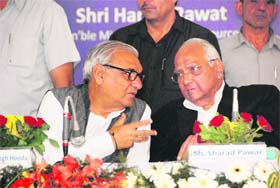 Chief Minister Bhupinder Singh Hooda and Union Agriculture Minister Sharad Pawar at the inauguration of NIFTEM in Kundli on Wednesday