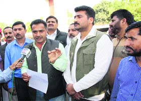 Jammu and Kashmir Panchayat Conference chairman Shafiq Mir talks to mediapersons in Jammu on Wednesday