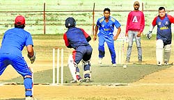 Players in action during the Eid Diwali milan cricket cup at MA Stadium in Jammu on Wednesday
