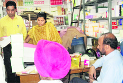 A Drug Inspector inspects a medical store at Khanna on Wednesday. a tribune photograph