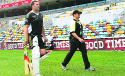 South Africas Jacques Kallis is escorted by a security guard after nets in Brisbane on Wednesday.  AP/PTI