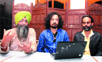The director of Sadda Haq, Kuljinder Sidhu (centre), actor Dinesh Sood (right) and lyricist Amardeep Gill addressing mediapersons in Bathinda on Thursday. A Tribune photograph