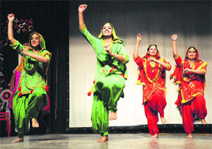 Students perform bhangra at a commercial fest, APRATIM 2012, at MCM DAV College in Sector 36, Chandigarh, on Thursday.