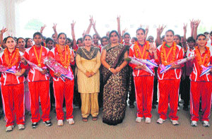 Members of the Indian Roller Skating team with principals and students of Shah Satnam Ji Institutes, Sirsa.
