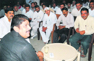 INLD leader Ajay Singh Chautala addresses party workers at his residence in Hisar.