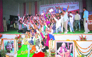 Members of the Yamunanagar Zone team, which lifted the overall trophy at the Inter-Zonal Youth Festival, celebrate their victory on the concluding day at Hisar.