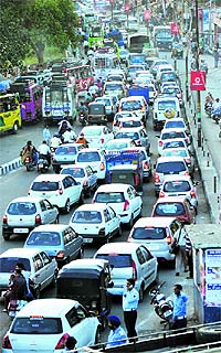Long queues of vehicles seen on College Road in Jammu on Thursday