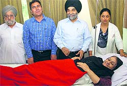 Mina, mother of the Governor of Herat, a province of Afghanistan, with Dr Charanjit Singh Pruthi at BBC Heart Care Hospital in Jalandhar on Thursday