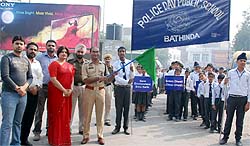 ASP (City) Ketan Patil Baliram flagging off an anti-cracker rally organised by the students of the Police Public School in Bathinda on Friday