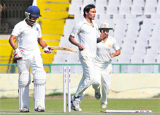 Sandeep Sharma rattles Anustup Majumdars timber during the Punjab-Bengal tie.
