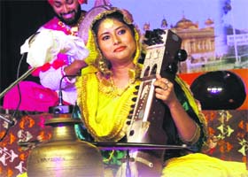 In tune with traditions: A student plays a string instrument during a folk competition at the 28th North Zone Inter-University Youth Festival at Guru Nanak Dev University in Amritsar on Saturday