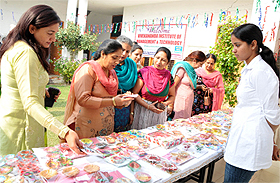 Visitors have a look at the items on display at the Diwali Mela organised at Vivekananda College for Girls. 