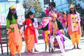 Students of Mussoorie Girls Inter-College present a skit during the annual day celeberations in Mussoorie on Saturday