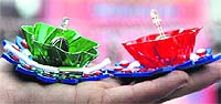 Designer glass diyas available in the market