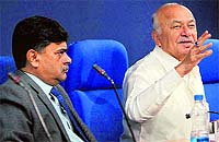 Union Home Minister Sushikumar Shinde and Home Secretary RK Singh (L) in New Delhi on Saturday